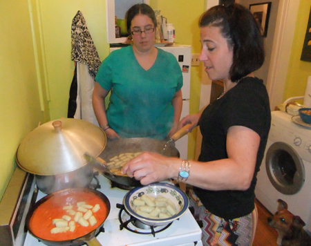 Cooking the gnocchi. 