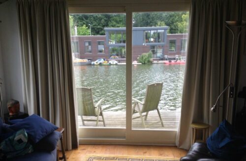 Nicole worked on a houseboat in Amsterdam. Let's say the house across the way was much nicer than the one she was in but hey, still cozy with coffee and WiFi. 